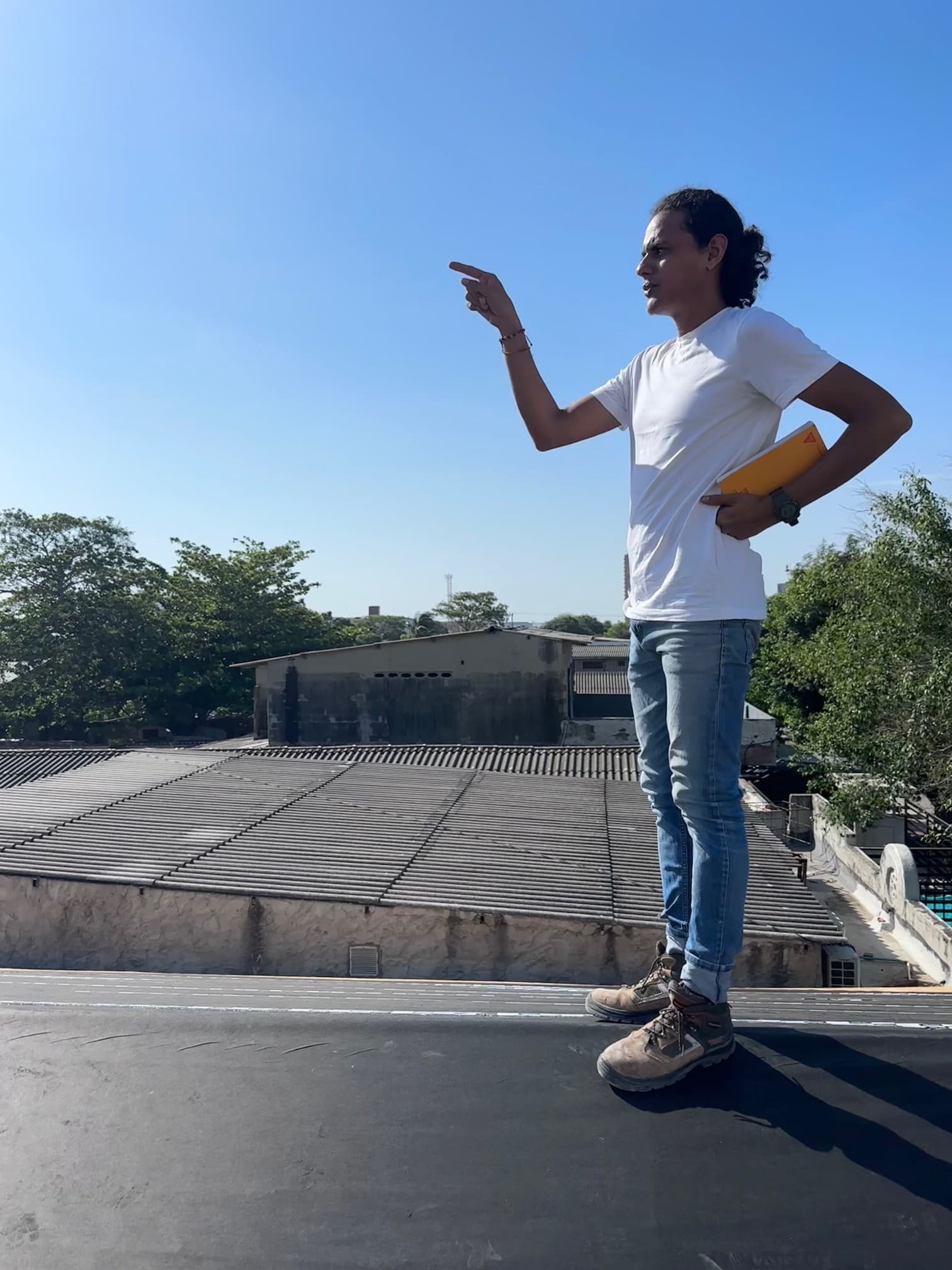 Cristian inspecting the roof