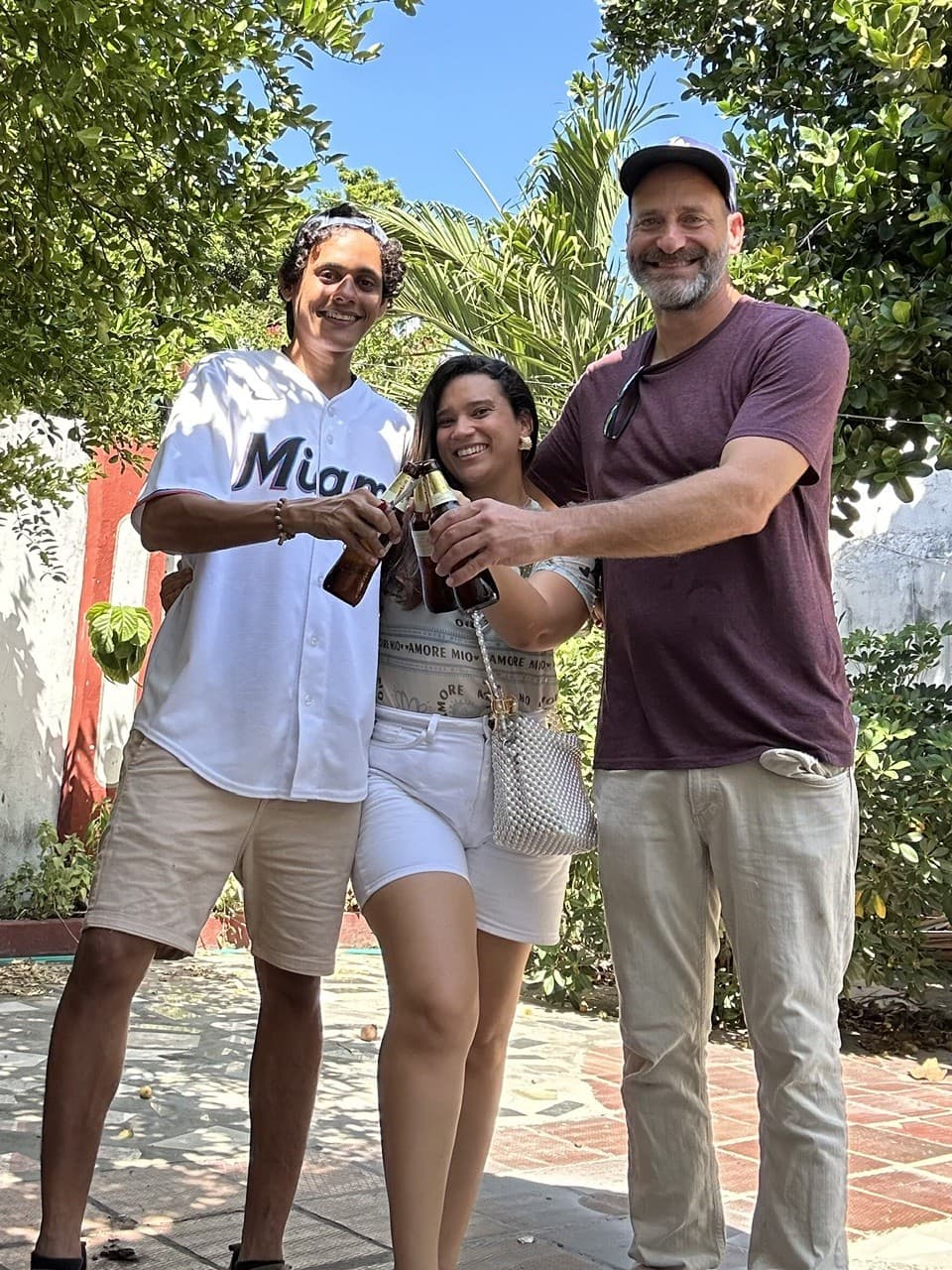 Celebrating the purchase — Cristian, Pat and Angélica